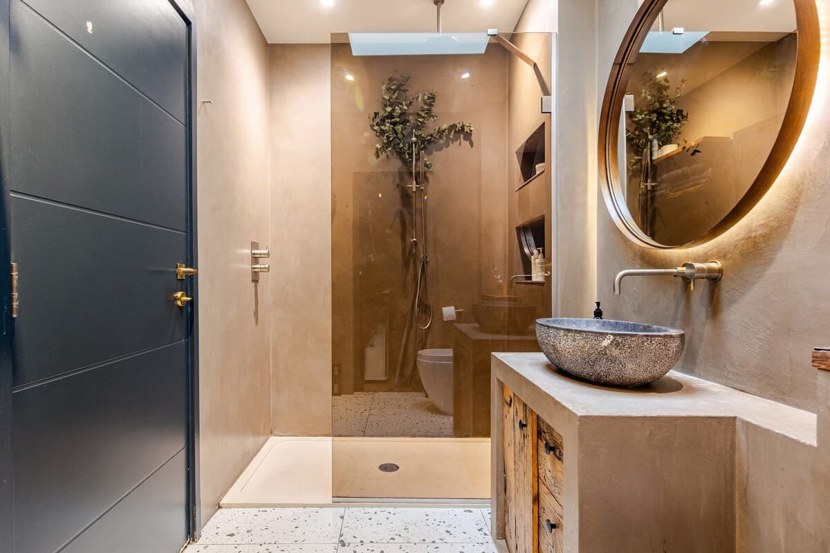 Tadelakt bathroom with rainfall shower