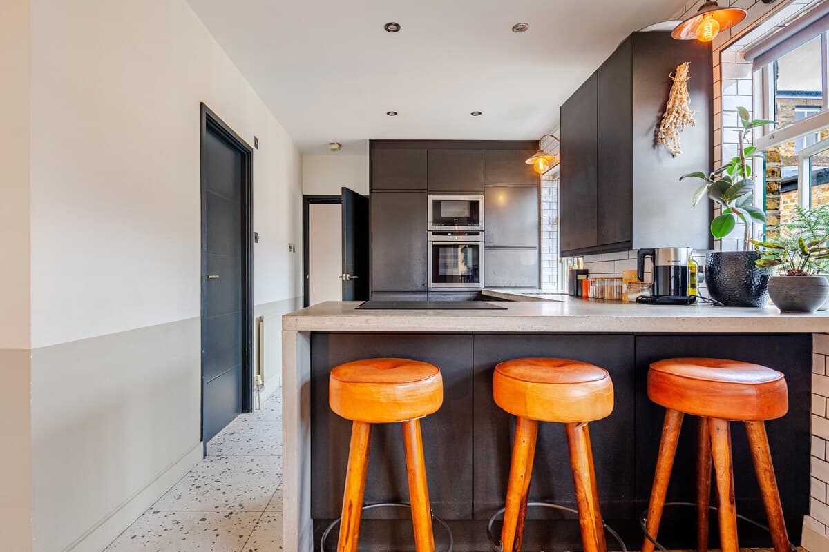 Kitchen with bar stools